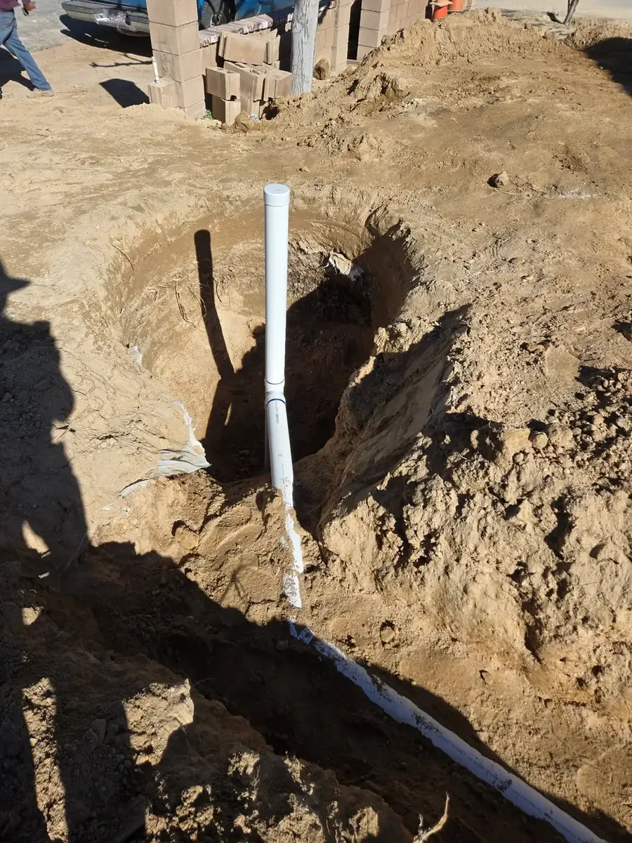 Plumbing connections for a septic system installation