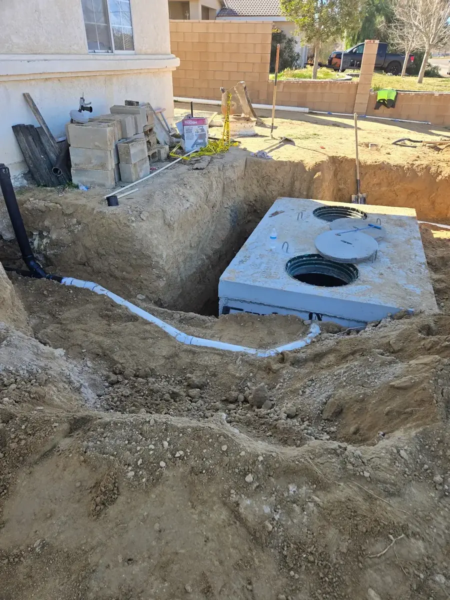 Septic tank being installed underground